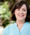 Dr. Gayle Watkins, Phd is smiling at the camera